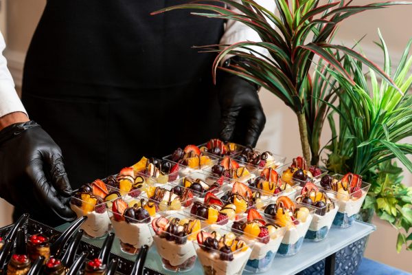 cup-dessert-with-whipped-cream-strawberries-cherries-orange